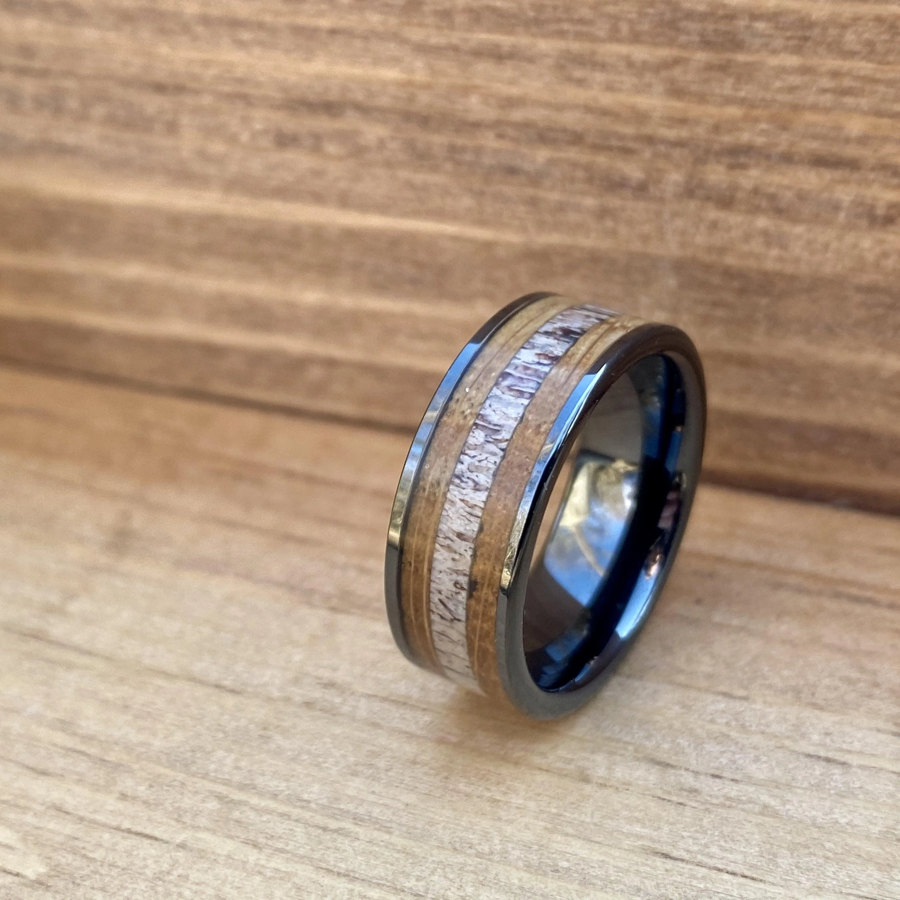 "The Outdoorsman" Black Ceramic Ring With Deer Antler and Bourbon Whiskey Barrel Wood